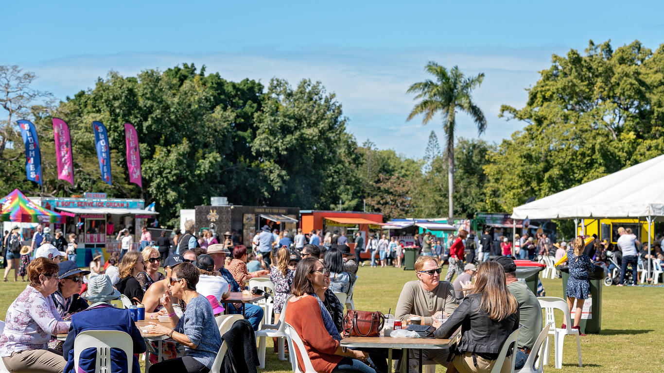Crowd of people at city's annual outdoor food and wine festival