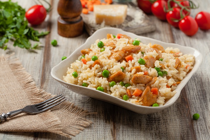 Delicious risotto with chicken and green peas.