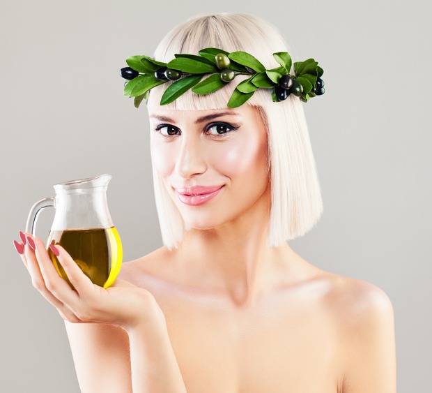Beautiful-Healthy-Woman-on-Background-with-Copy-Space.-Cute-Girl-with-Olive-Oil
