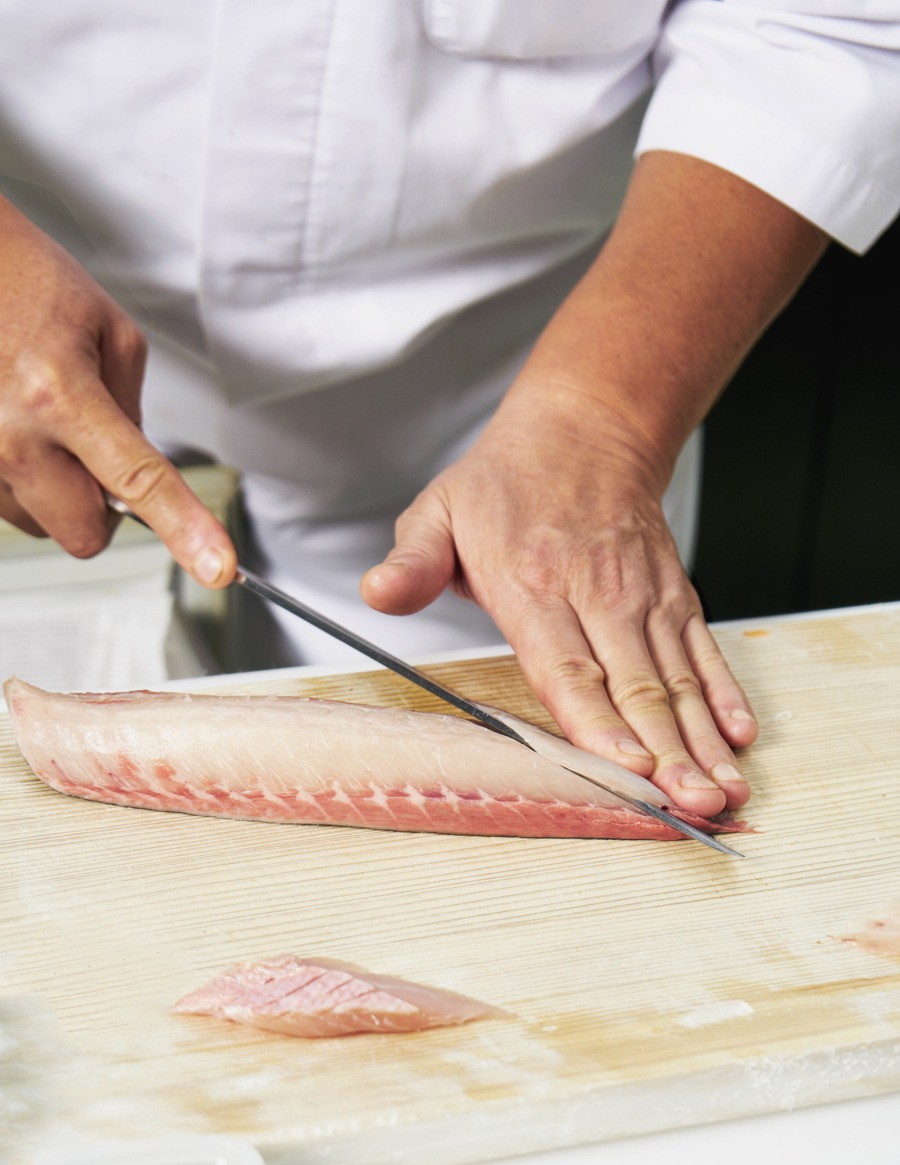 Red sea bream sashimi, Fresh Madai fish sliced by Japanese chef.